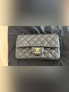 CHANEL Black Quilted Lambskin Flap Bag with Gold CC Lock